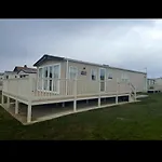 Prázdninový areál Fabulous Seaside Caravan Getway At Cayton Bay *